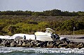 DSC_7664 boat wrecked on riprap.jpg