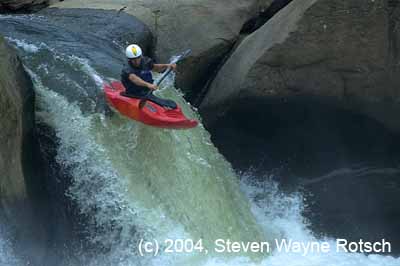 DSC_4939 over the falls--red kayak